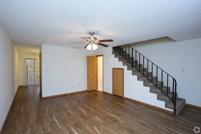 Open living area with stairs to the second floor