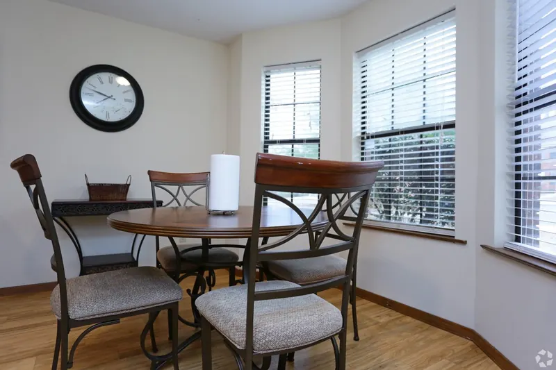 Dining nook with a round table and chairs
