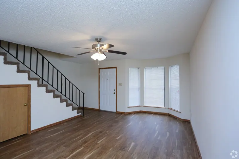 Living room with a staircase in a two-story apartment